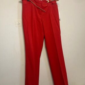 Calvin Klein ladies Bold Red Dress Pants with a slim gold belt.